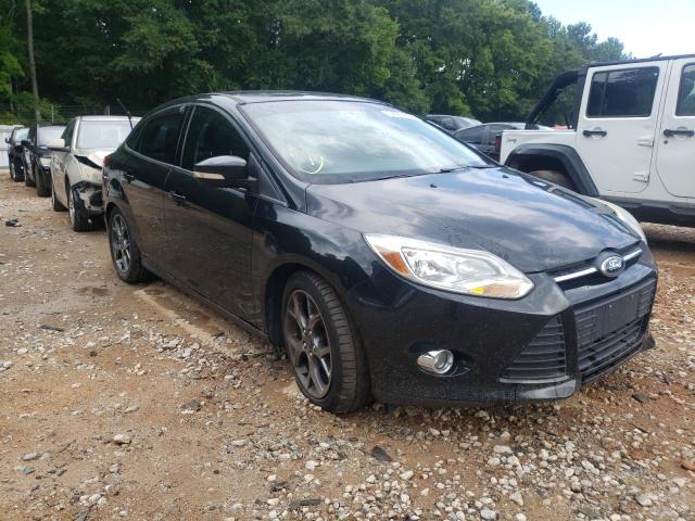 FORD FOCUS SE 2014 with VIN 1FADP3F22EL165518 - Photo from auction