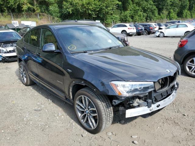 BMW X4 XDRIVE2 2015 with VIN 5UXXW3C51F0M86783 - Photo from auction