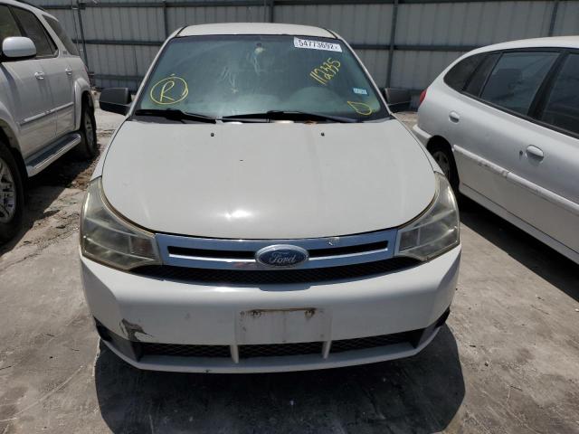 Photo 9 from auction – 2009 FORD FOCUS S with VIN 1FAHP34N09W112335