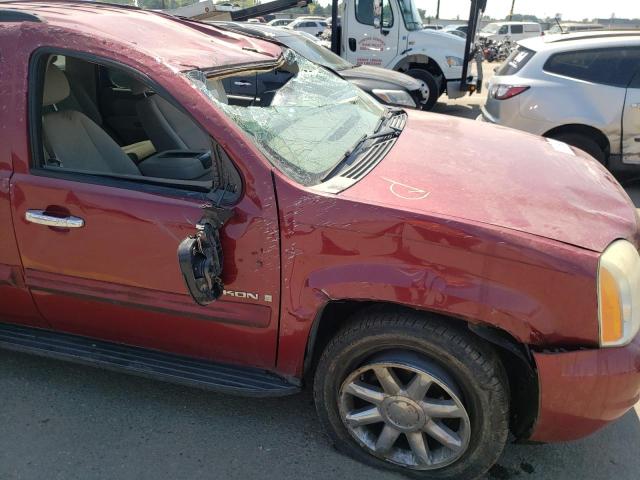 Photo 10 from auction – 2007 GMC YUKON with VIN 1GKFK13027J118579