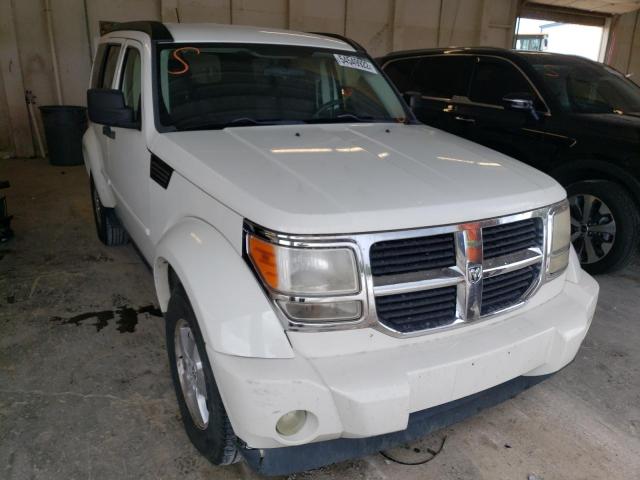 Photo 9 from auction – 2009 DODGE NITRO SE with VIN 1D8GU28K19W513693