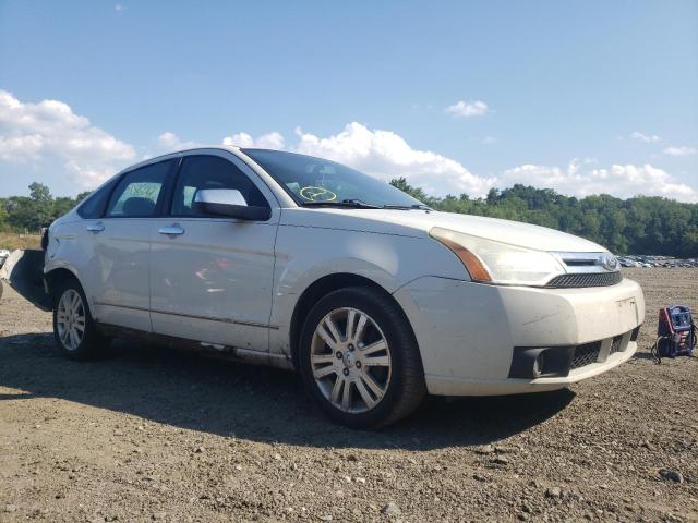 FORD FOCUS SEL 2011 with VIN 1FAHP3HN7BW123784 - Photo from auction