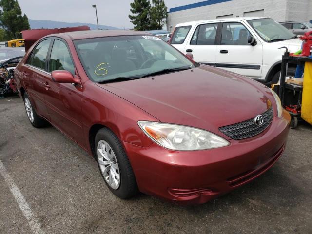 TOYOTA CAMRY LE 2002 with VIN 4T1BF30K42U018275 - Photo from auction
