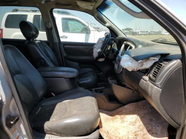 Photo 5 from auction – 2004 MAZDA TRIBUTE with VIN 4F2CZ06144KM09471
