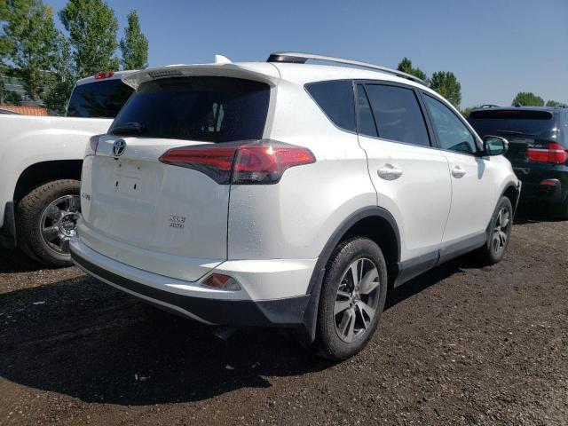 Photo 4 from auction – 2017 TOYOTA RAV4 XLE with VIN 2T3RFREV0HW645690