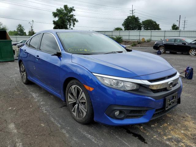 HONDA CIVIC EX 2018 with VIN JHMFC1F32JX022291 - Photo from auction