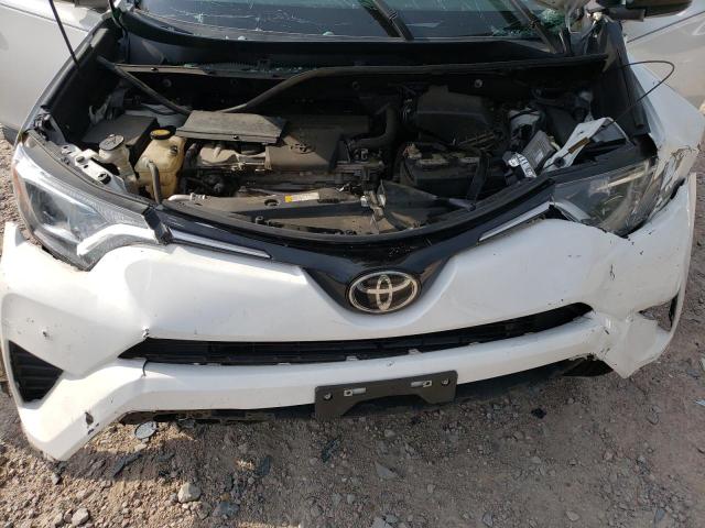 Photo 7 from auction – 2018 TOYOTA RAV4 LE with VIN 2T3BFREV9JW754236