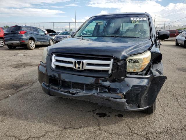 Photo 9 from auction – 2006 HONDA PILOT EX with VIN 2HKYF18646H510363
