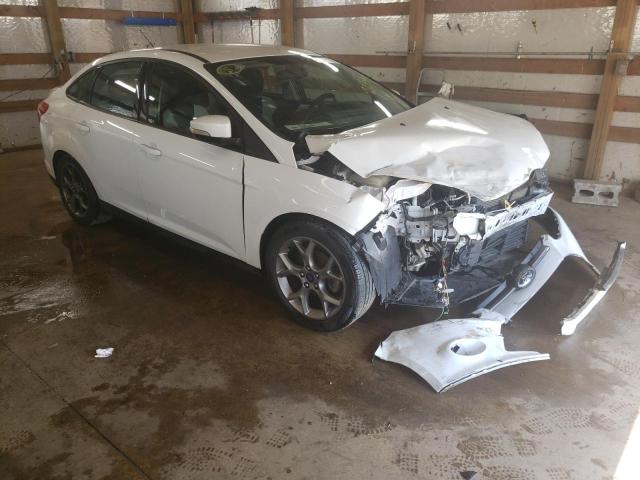 FORD FOCUS SE 2014 with VIN 1FADP3F23EL323994 - Photo from auction