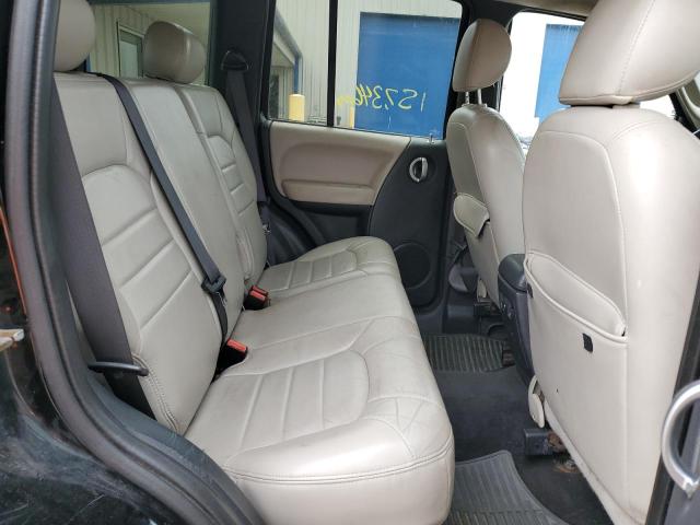 Photo 6 from auction – 2002 JEEP LIBERTY LI with VIN 1J8GL58K32W329244