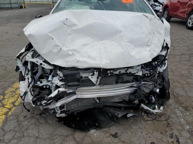 Photo 9 from auction – 2021 TOYOTA COROLLA SE with VIN 5YFS4MCE1MP089021