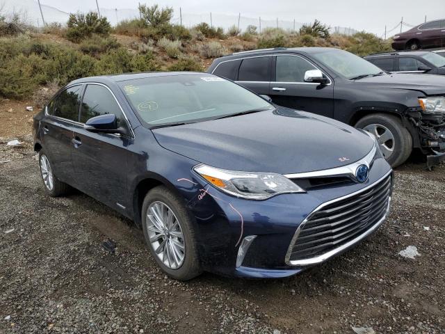 TOYOTA AVALON HYB 2018 with VIN 4T1BD1EB6JU064093 - Photo from auction