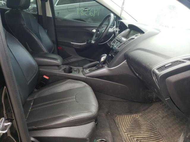 Photo 5 from auction – 2014 FORD FOCUS TITA with VIN 1FADP3J20EL409299