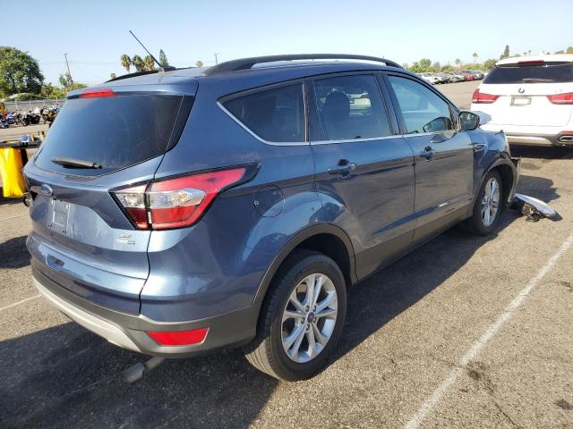 Photo 4 from auction – 2018 FORD ESCAPE SE with VIN 1FMCU9GD0JUC03555