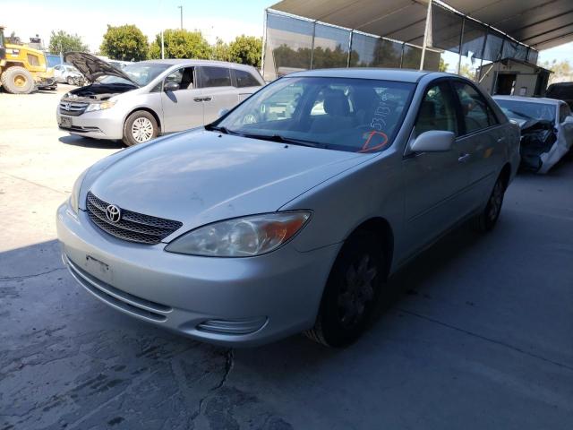 Photo 2 from auction – 2002 TOYOTA CAMRY LE with VIN JTDBE32K520112418