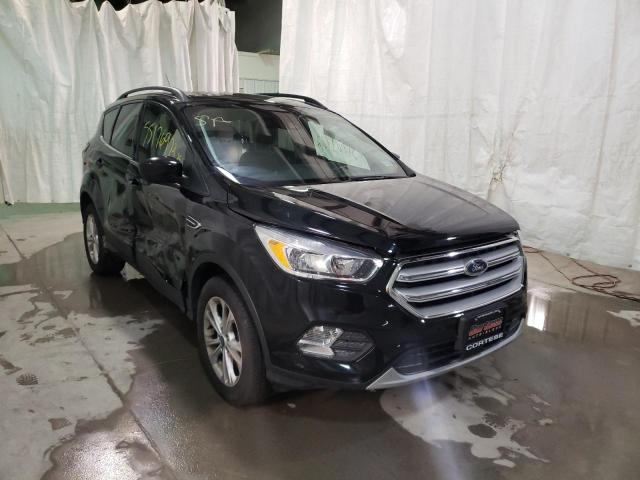 FORD ESCAPE SE 2018 with VIN 1FMCU9GD7JUC25018 - Photo from auction