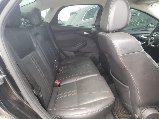 Photo 6 from auction – 2014 FORD FOCUS TITA with VIN 1FADP3J20EL409299