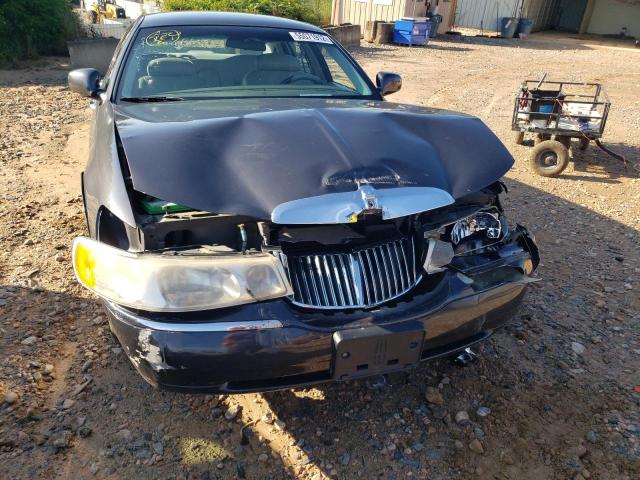 Photo 9 from auction – 1999 LINCOLN TOWN CAR E with VIN 1LNHM81W6XY687212