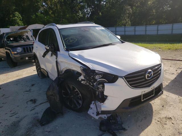MAZDA CX-5 GT 2016 with VIN JM3KE4DY6G0878633 - Photo from auction