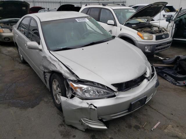 TOYOTA CAMRY LE 2004 with VIN 4T1BF30K54U588174 - Photo from auction
