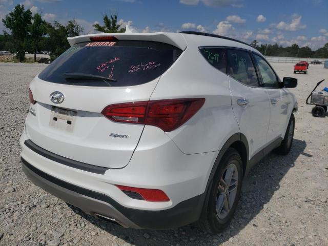 Photo 4 from auction – 2017 HYUNDAI SANTA FE S with VIN 5NMZU3LB0HH017273