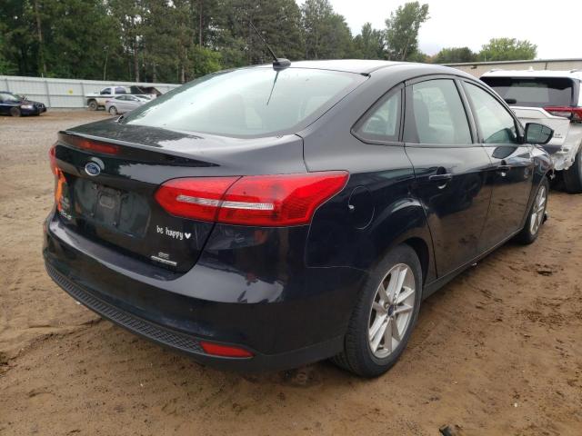 Photo 4 from auction – 2015 FORD FOCUS SE with VIN 1FADP3F27FL348530