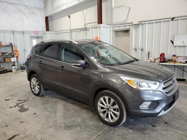 FORD ESCAPE TIT 2017 with VIN 1FMCU0JD7HUC74413 - Photo from auction