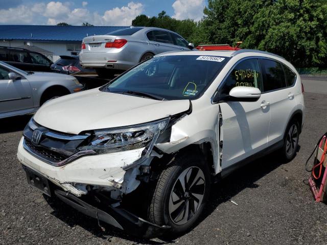 Photo 2 from auction – 2016 HONDA CR-V TOURI with VIN 5J6RM4H91GL132998
