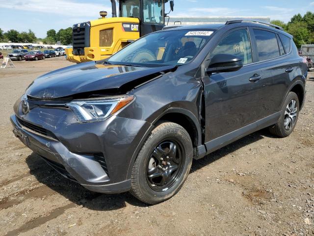 Photo 2 from auction – 2018 TOYOTA RAV4 LE with VIN JTMBFREV8JJ731674