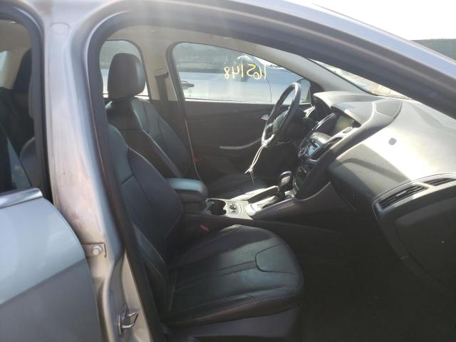 Photo 5 from auction – 2014 FORD FOCUS TITA with VIN 1FADP3J23EL447111
