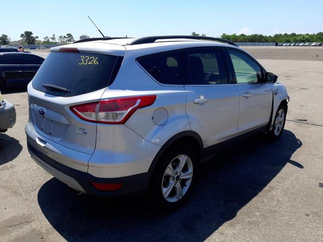 Photo 4 from auction – 2016 FORD ESCAPE SE with VIN 1FMCU9G92GUB63225