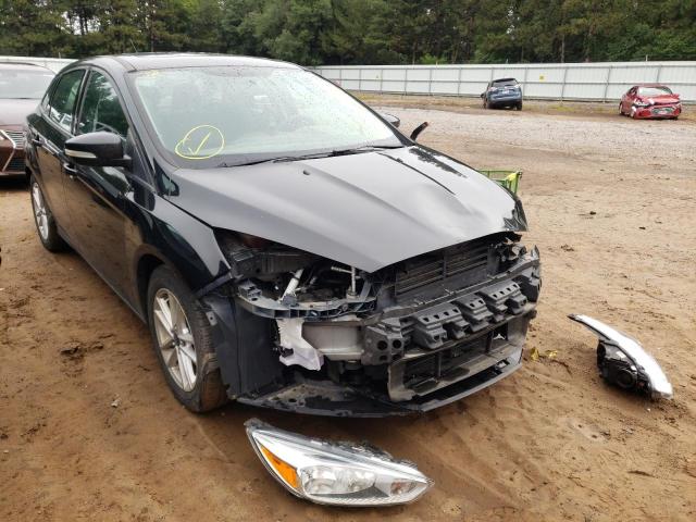 FORD FOCUS SE 2015 with VIN 1FADP3F27FL348530 - Photo from auction