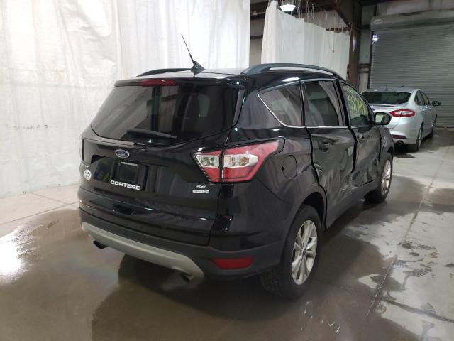 Photo 4 from auction – 2018 FORD ESCAPE SE with VIN 1FMCU9GD7JUC25018