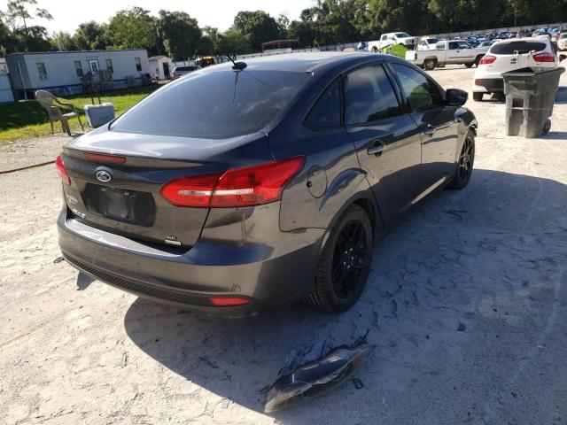 Photo 4 from auction – 2016 FORD FOCUS SE with VIN 1FADP3FE1GL313879