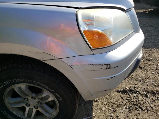 Photo 9 from auction – 2004 HONDA PILOT EX with VIN 2HKYF18404H599571