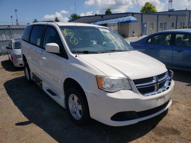 DODGE GRAND CARA 2013 with VIN 2C4RDGCG1DR581470 - Photo from auction