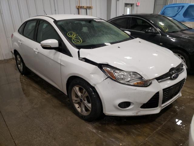 FORD FOCUS SE 2014 con VIN 1FADP3F23EL421617 - Foto de la subasta