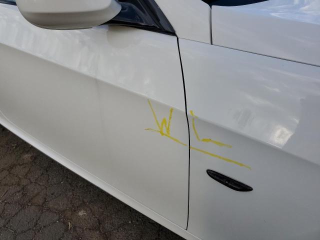 Photo 9 from auction – 2012 BMW 335 XI with VIN WBAKF9C59CE859014
