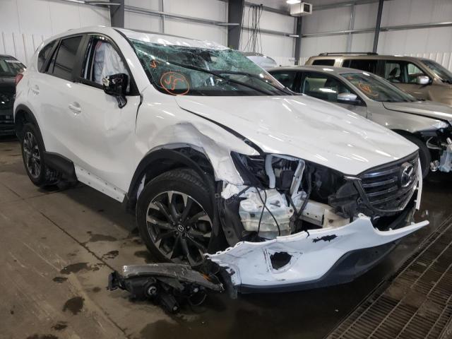 MAZDA CX-5 GT 2016 with VIN JM3KE4DY4G0849146 - Photo from auction