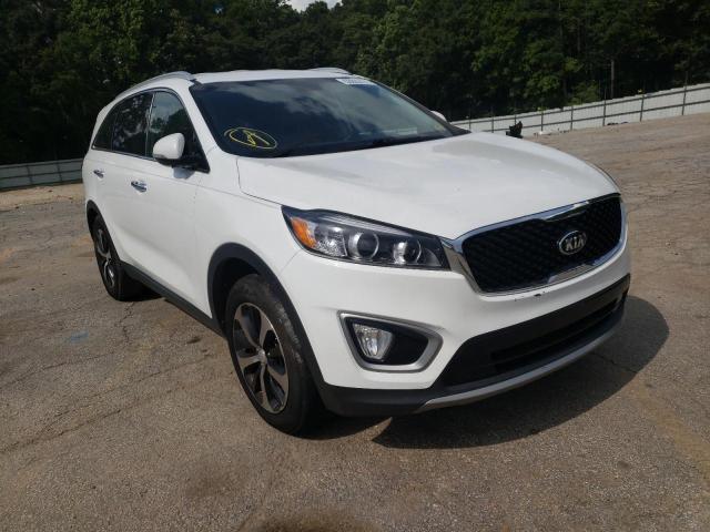 KIA SORENTO EX 2016 with VIN 5XYPH4A52GG085128 - Photo from auction