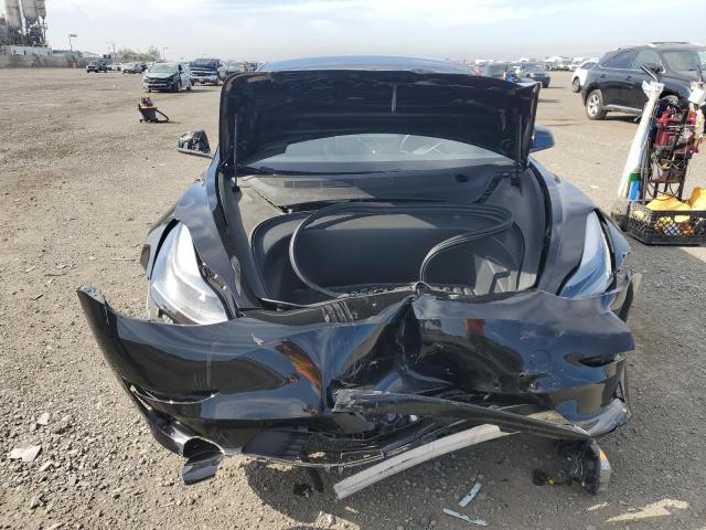 Photo 9 from auction – 2021 TESLA MODEL 3 with VIN 5YJ3E1EA4MF922056