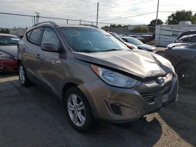 HYUNDAI TUCSON GLS 2011 with VIN KM8JUCAC1BU157840 - Photo from auction