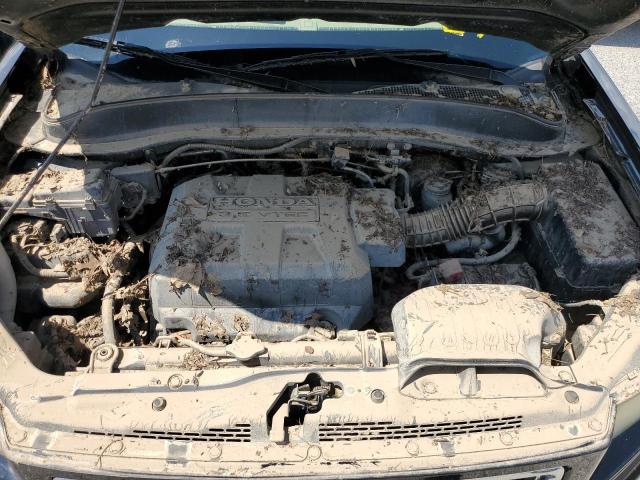 Photo 7 from auction – 2007 HONDA RIDGELINE with VIN 2HJYK16307H541202