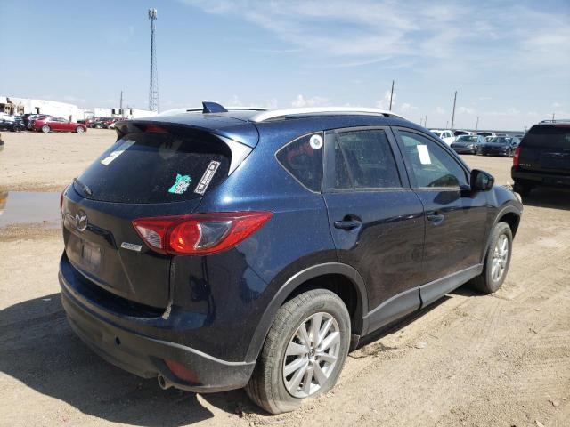 Photo 4 from auction – 2014 MAZDA CX-5 TOURI with VIN JM3KE2CY7E0390116