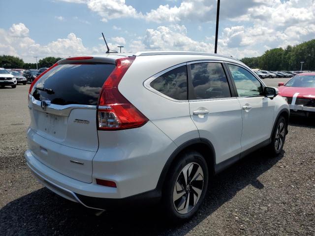 Photo 4 from auction – 2016 HONDA CR-V TOURI with VIN 5J6RM4H91GL132998