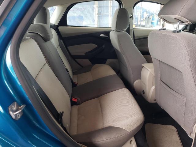 Foto 6 de la subasta – 2014 FORD FOCUS SE con VIN 1FADP3K29EL159771