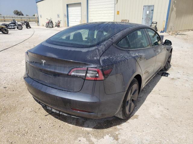 Photo 4 from auction – 2022 TESLA MODEL 3 with VIN 5YJ3E1EA9NF186670