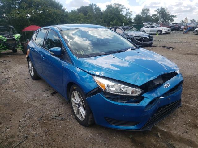 FORD FOCUS SE 2015 with VIN 1FADP3K28FL259846 - Photo from auction