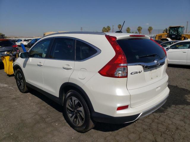 Photo 3 from auction – 2016 HONDA CR-V TOURI with VIN 5J6RM3H99GL014353