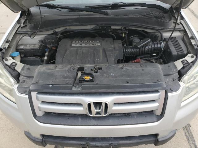 Photo 7 from auction – 2006 HONDA PILOT with VIN 2HKYF18686H562739